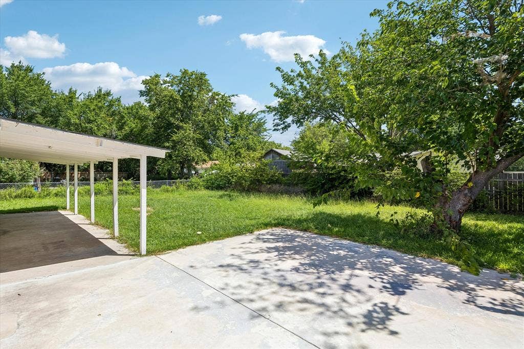 716 Heathcliff Drive, Everman, TX 76140 Fantastic covered patio with additional entertainment space