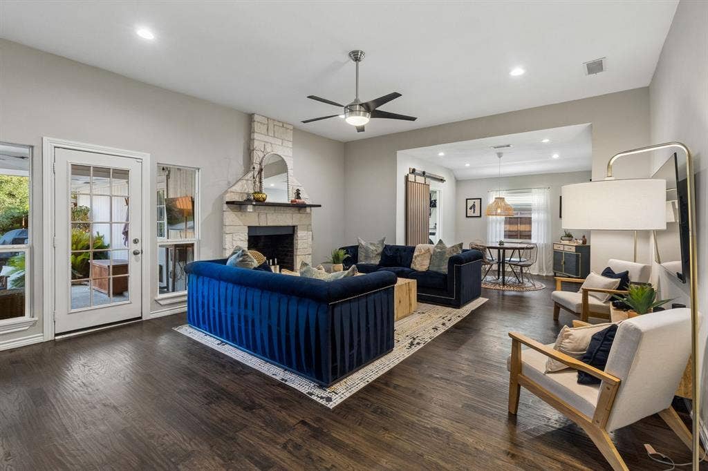 6708 McCallum Boulevard, Dallas, TX 75252 Spacious living with stone fireplace