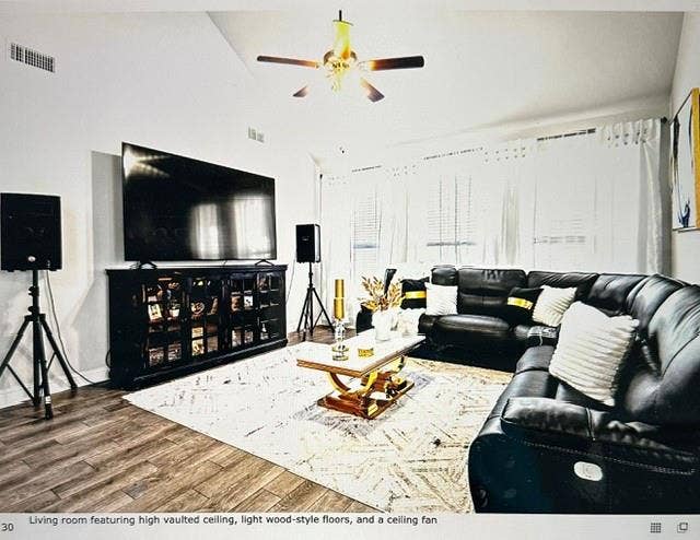 4220 Calla Drive, Forney, TX 75126 Living room featuring high vaulted ceiling, light wood-style floors, and a ceiling fan