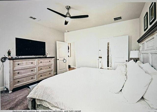4220 Calla Drive, Forney, TX 75126 Bedroom with ceiling fan, connected bathroom, and light carpet