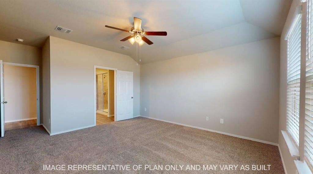 10325 Altair Drive, Waco, TX 76708 Spacious room featuring vaulted ceilings, neutral-toned carpeting, and a ceiling fan with integrated lighting