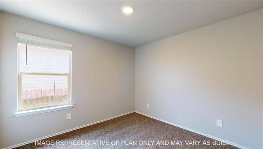 10325 Altair Drive, Waco, TX 76708 Neutral paint palette with recessed lighting and a single window with blinds