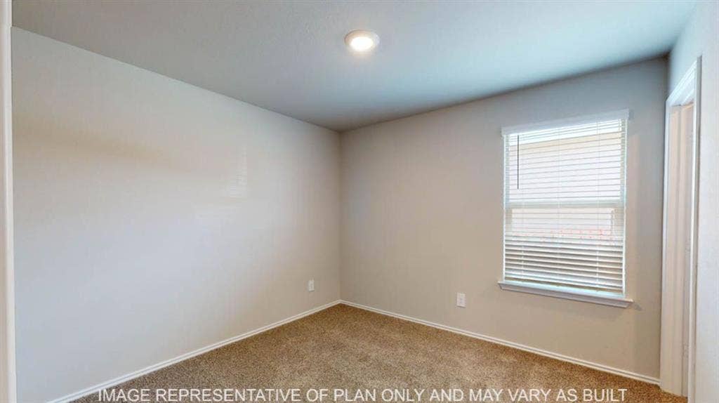 10325 Altair Drive, Waco, TX 76708 Neutral-toned walls complement the textured brown carpeting