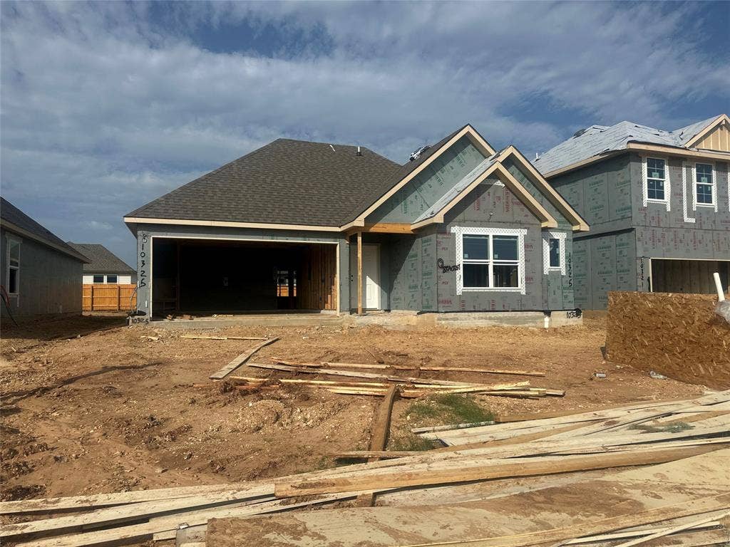 10325 Altair Drive, Waco, TX 76708 Newly constructed residence featuring an attached two-car garage, multiple gables, and a dark shingle roof