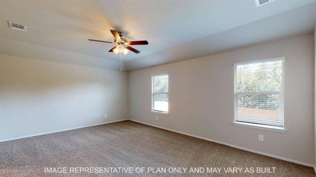 10317 Altair Drive, Waco, TX 76708 Spacious room with plush carpet flooring and neutral wall tones