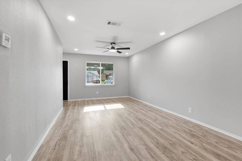 857 Twilight Trail, Grapevine, TX 76051 Spacious room featuring wood-finish flooring, recessed lighting, and a ceiling fan