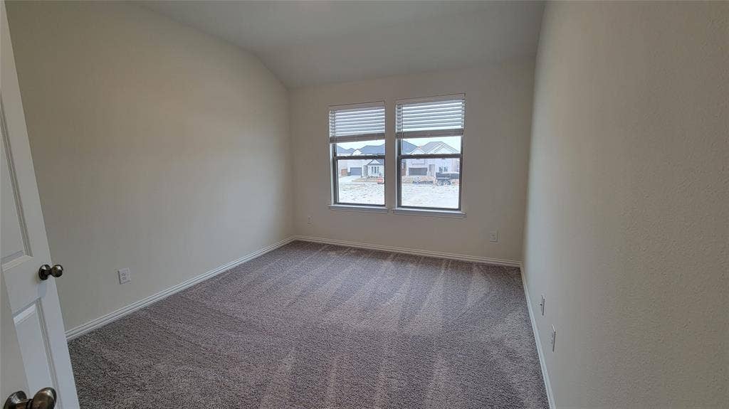 11346 Sugarlands Drive, Frisco, TX 75035 Neutral-toned walls and plush gray carpeting characterize this room