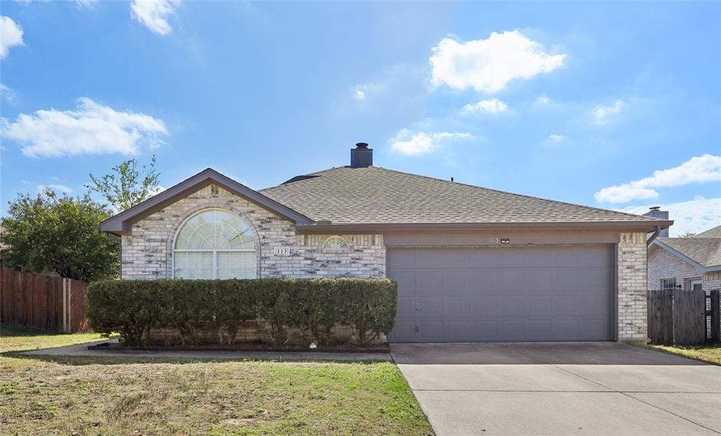 113 Bridlegate Drive, McKinney, TX 75069 Single-story brick exterior featuring a prominent arched window, shingle roof, two-car garage, and concrete driveway