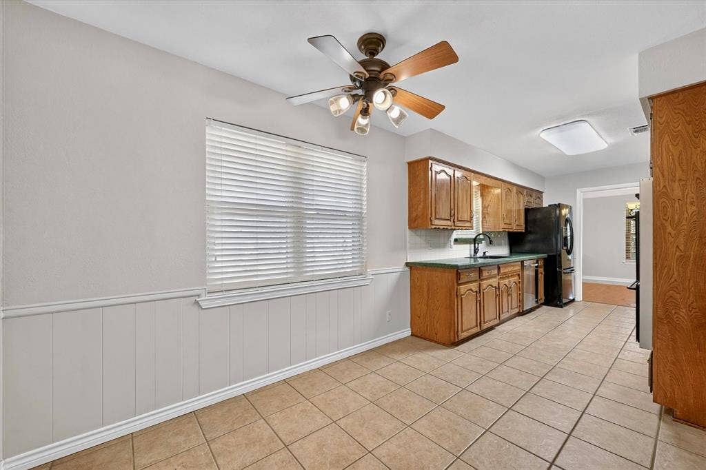 3310 Raintree Drive, Plano, TX 75074 Informal dining area with natural light and easy access to kitchen