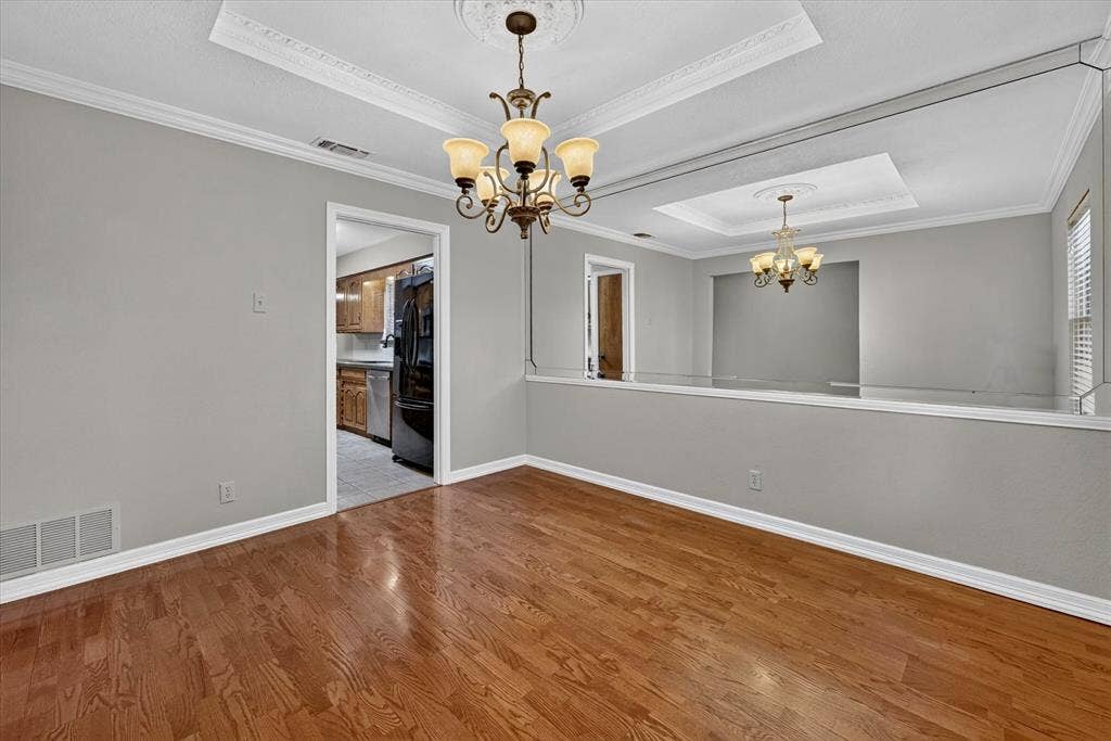 3310 Raintree Drive, Plano, TX 75074 Formal dining room with entry to kitchen for easy entertaining