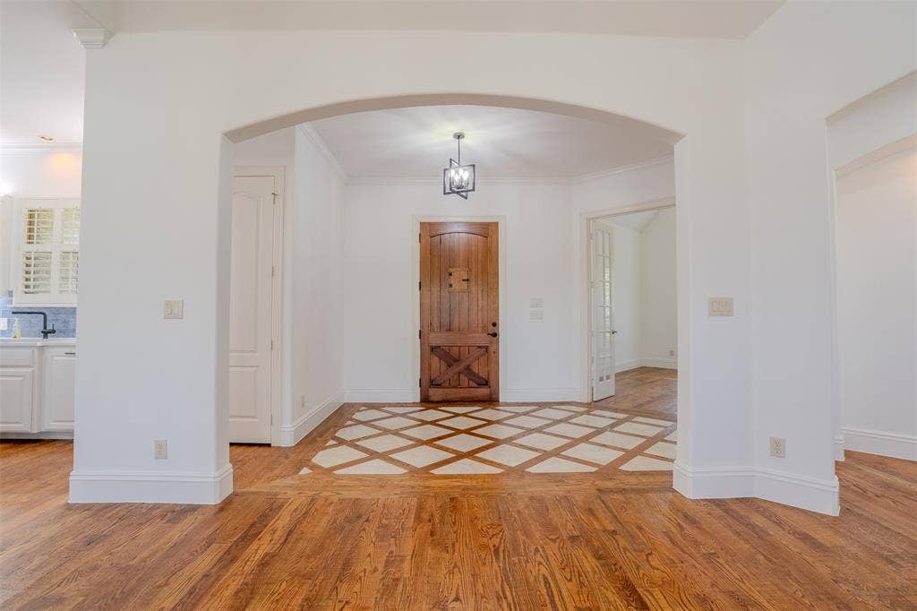 710 Corsica Court, Argyle, TX 76226 Entry way with peek-a-boo window in the solid wood door.
