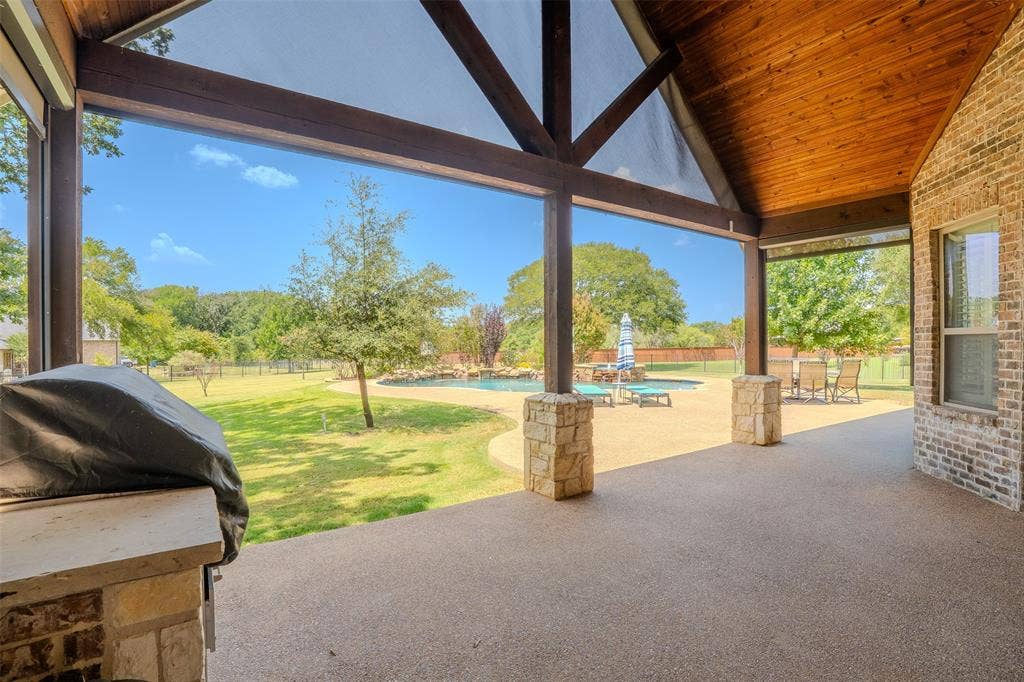 710 Corsica Court, Argyle, TX 76226 beautiful resort like back yard and remote controlled screens on patio