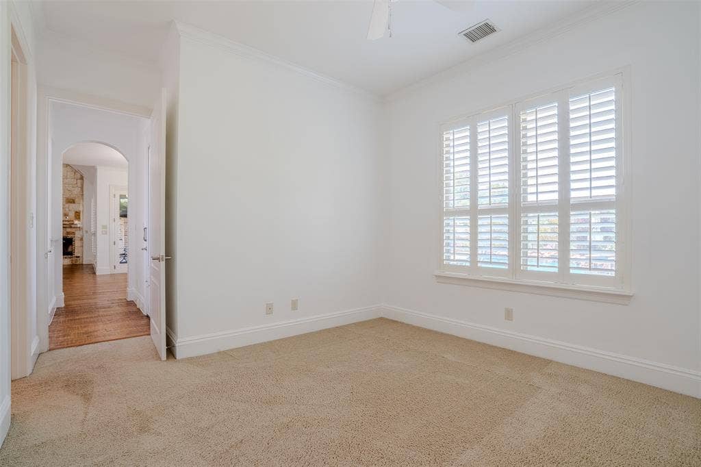 710 Corsica Court, Argyle, TX 76226 Downstairs secondary bedroom with adjoining bathroom.