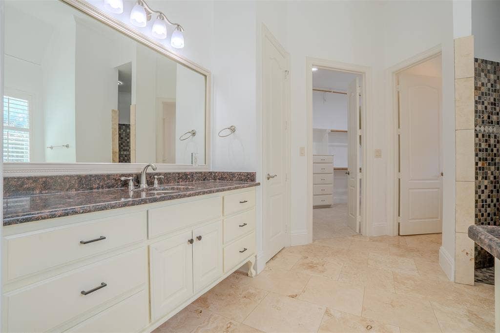 710 Corsica Court, Argyle, TX 76226 Primary bath with dual vanities and sinks, a walk in shower and jacuzzi tub