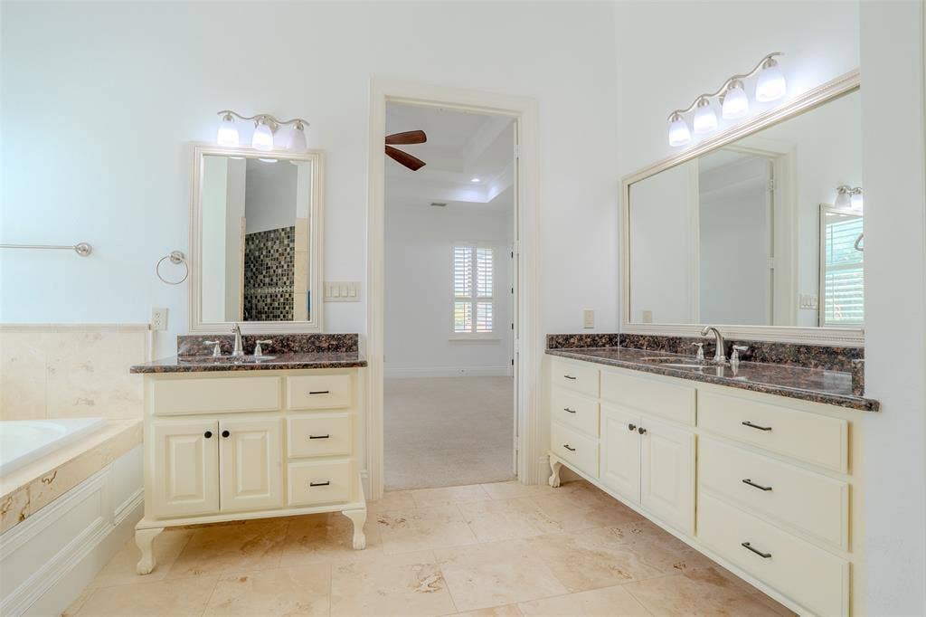 710 Corsica Court, Argyle, TX 76226 Travertine flooring in the primary bath