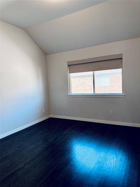 2455 Cathedral Drive, Richardson, TX 75080 3rd bedroom featuring dark wood-finish flooring and light-toned walls