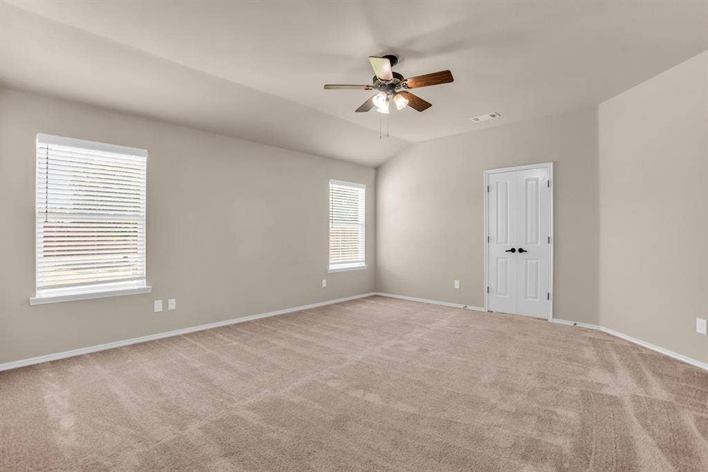 805 Andrews Court, Anna, TX 75409 Large primary bedroom with new windows and updated ensuite bath.