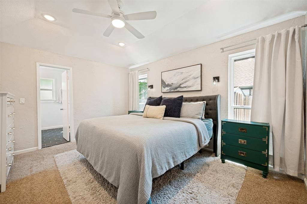 8420 Christie Drive, Frisco, TX 75033 Bedroom featuring a textured accent wall, recessed lighting, and a ceiling fan