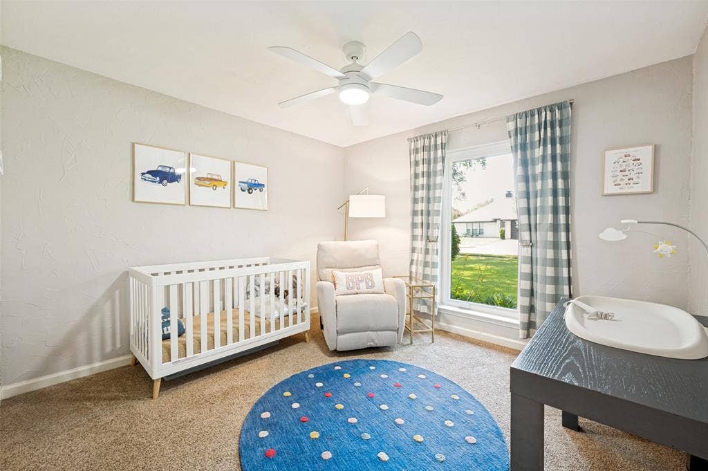 8420 Christie Drive, Frisco, TX 75033 3rd Bedroom features light gray textured walls, wall-to-wall carpeting, and a ceiling fan with integrated lighting