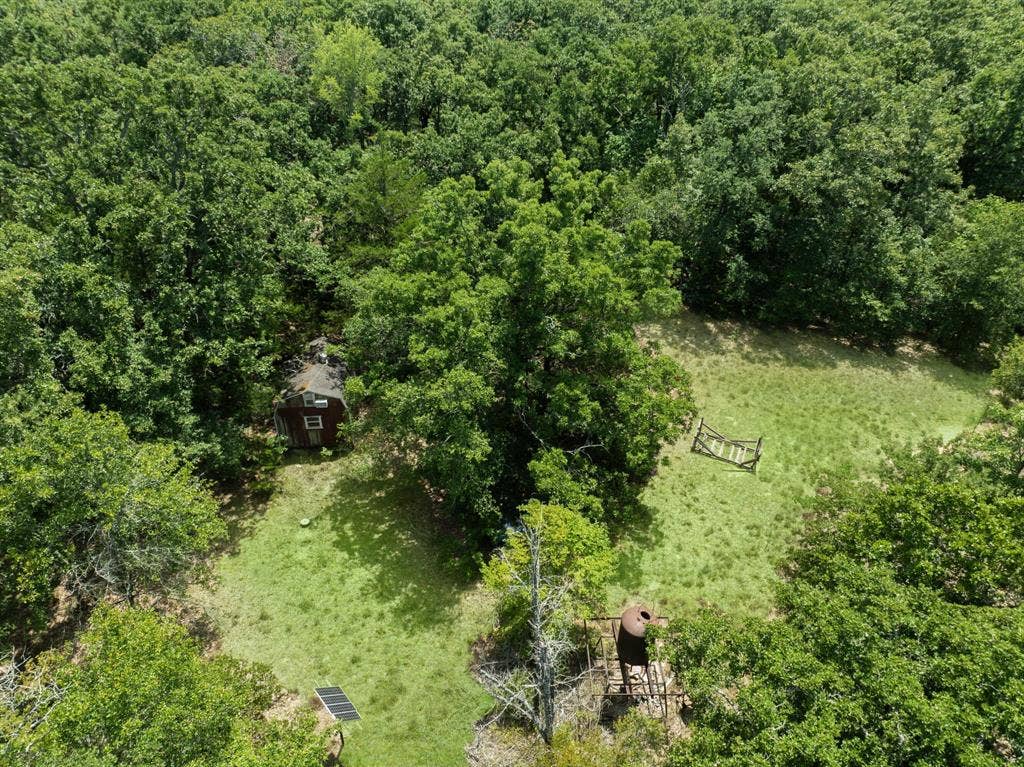 Aerial View of Shed, power pole, and well