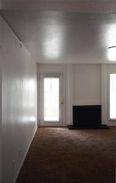 5500 Boca Raton Boulevard, #426, Fort Worth, TX 76112 Living area with brown carpeting and white walls