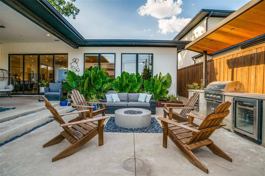 3766 Manana Drive, Dallas, TX 75220 View of patio featuring an outdoor living space with a fire pit, wine cooler, and exterior kitchen