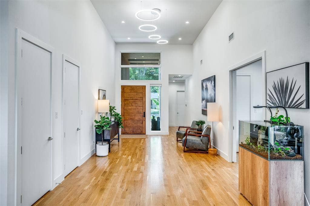 3766 Manana Drive, Dallas, TX 75220 Inviting foyer with a towering ceiling and designer lighting.