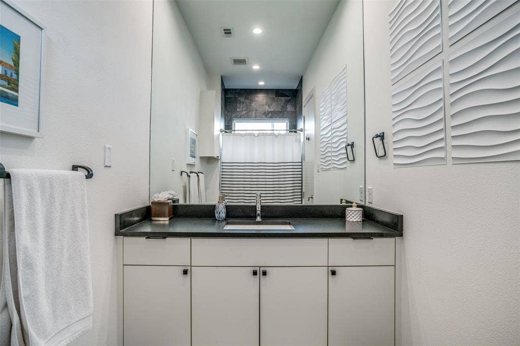 3766 Manana Drive, Dallas, TX 75220 Bathroom featuring vanity, a shower with curtain, and recessed lighting