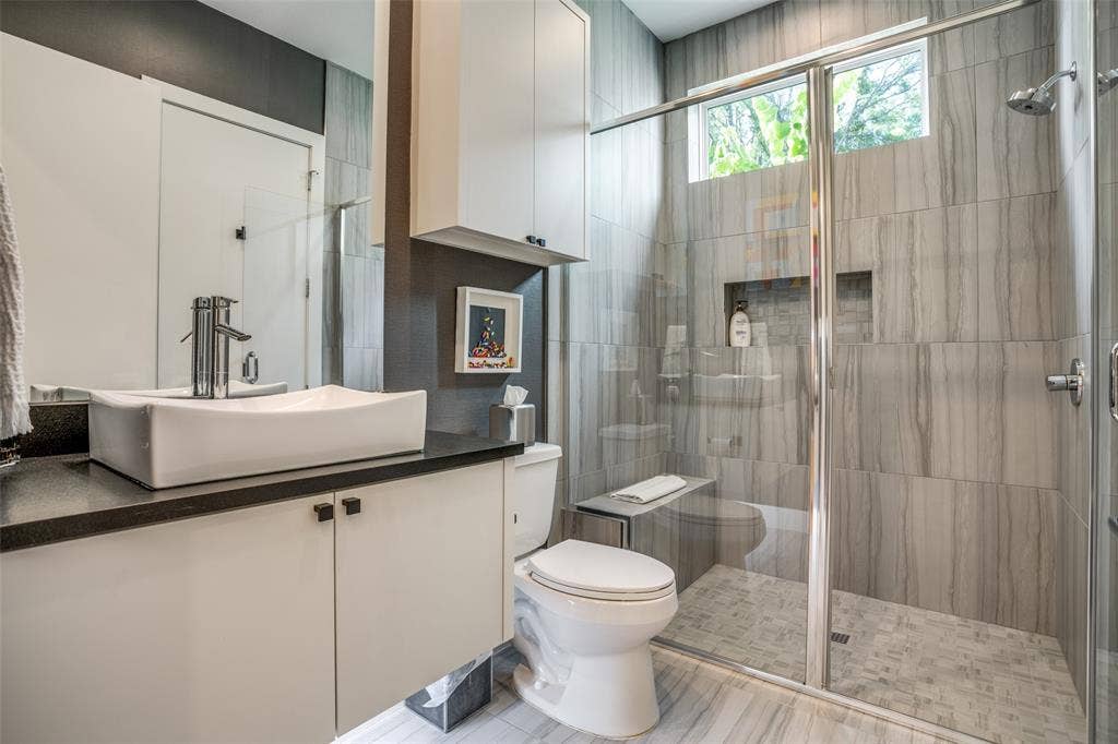 3766 Manana Drive, Dallas, TX 75220 Bathroom with vanity and a shower stall