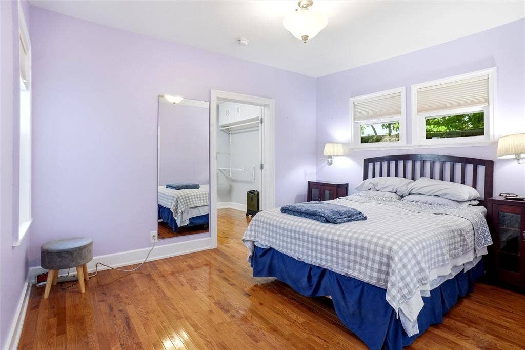 2306 Western Avenue, Fort Worth, TX 76107 Hardwood flooring extending throughout, complemented by a light purple wall color