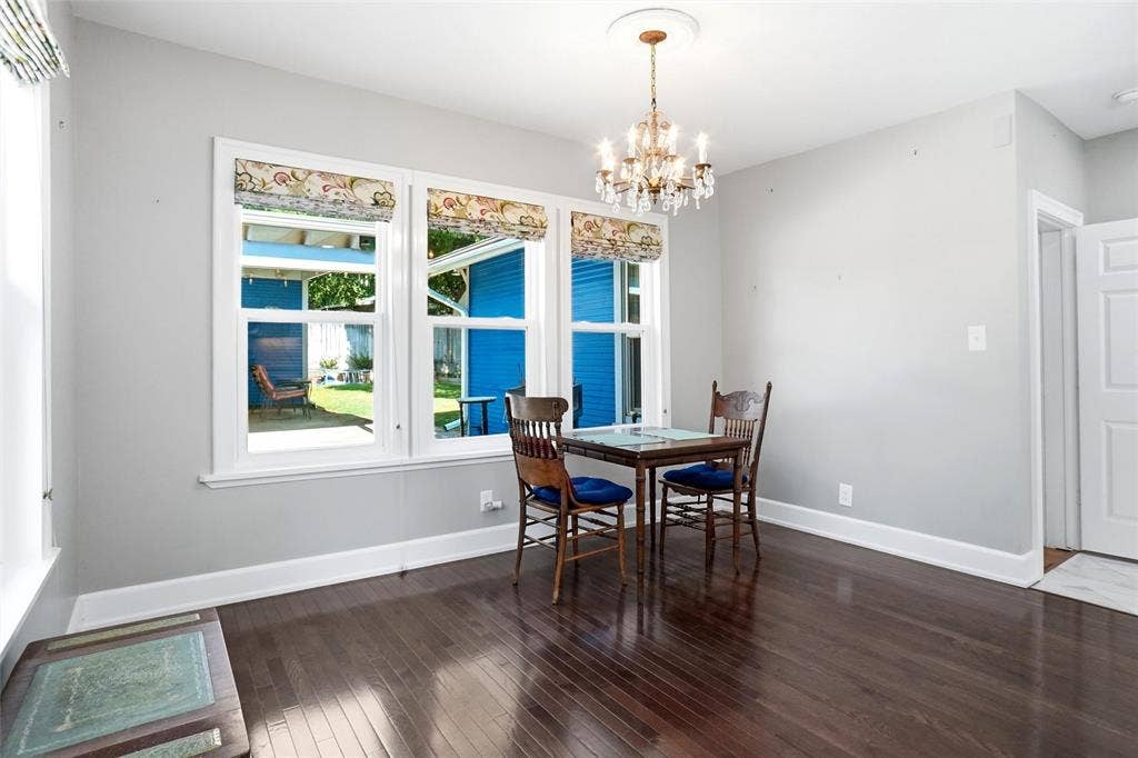 2306 Western Avenue, Fort Worth, TX 76107 Room featuring wood-finish flooring, light gray walls, and white trim