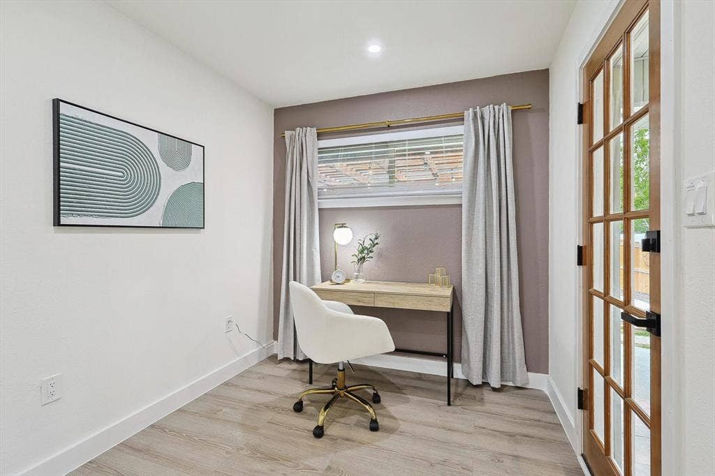 1208 Mayleaf Drive, Irving, TX 75060 Interior room with wood-finish flooring, recessed lighting, a window with blinds, and a glass-paneled wooden door with black hardware