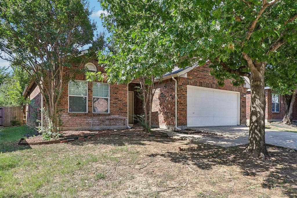 Brick exterior with an integrated two-car garage