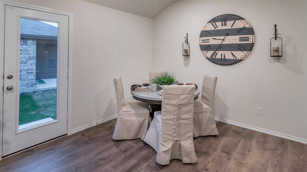 5618 Gannet Place, Crandall, TX 75114 Hardwood-finish flooring complementing light wall tones and white baseboards
