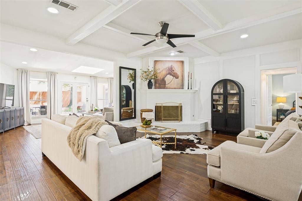 Open floor plan with two living areas open to kitchen