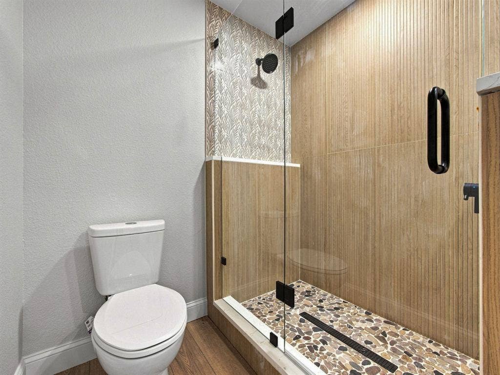 105 E Foggle Street, Athens, TX 75751 Primary bathroom glass enclosed shower
