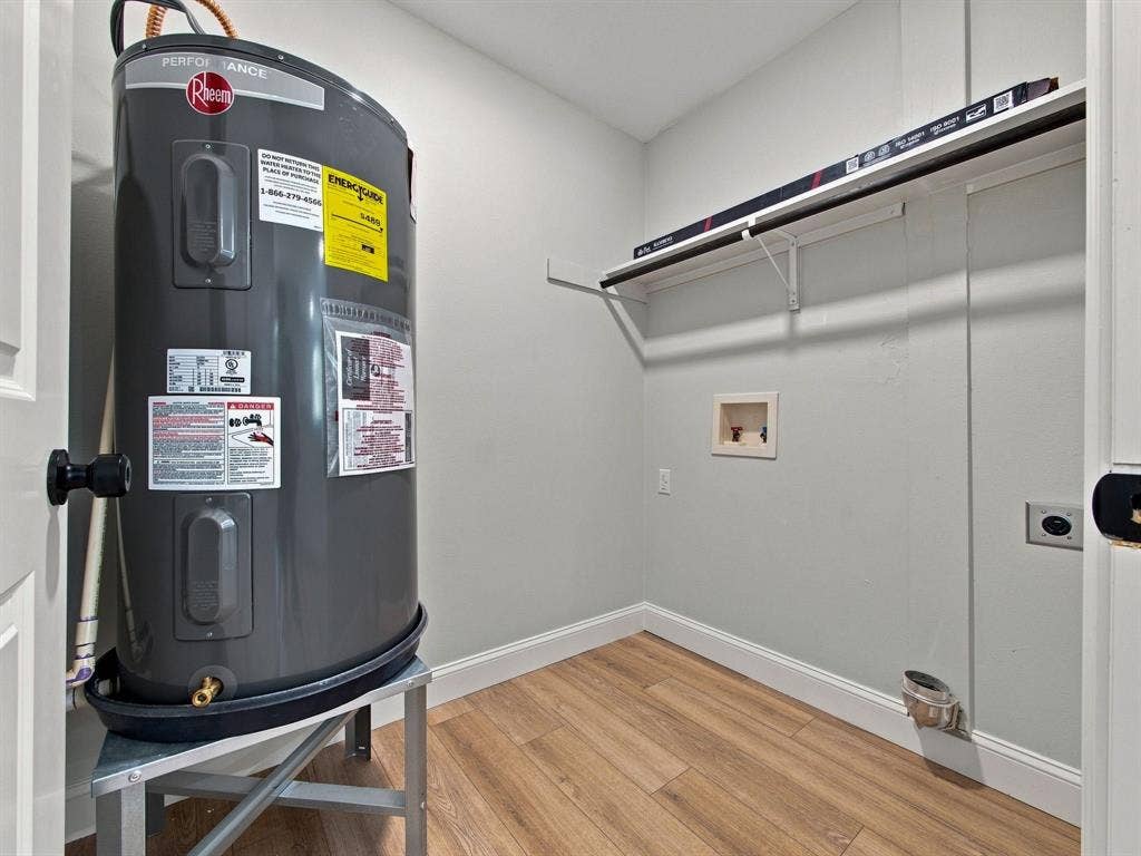 105 E Foggle Street, Athens, TX 75751 Laundry room with new water heater