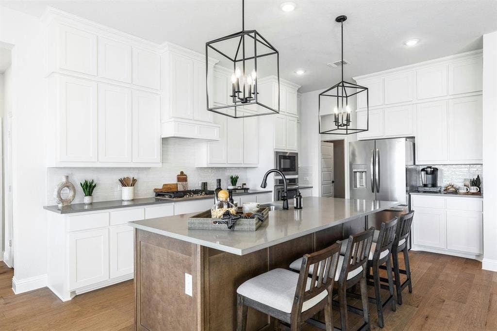 Kitchen side view of Kentsdale Farms home in DeSoto, TX by Kindred Homes