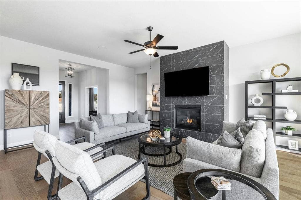 Living room and entryway of Kentsdale Farms home in DeSoto, TX by Kindred Homes