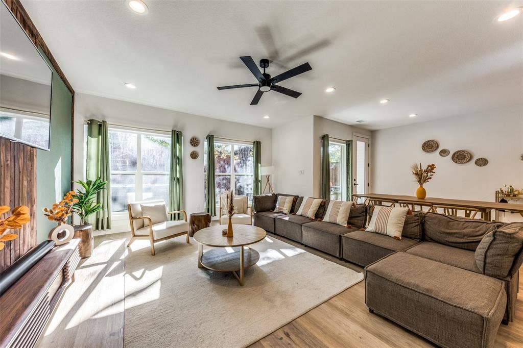 1116 Muncie Avenue, Dallas, TX 75212 Open-concept living area featuring wood-finish flooring, recessed lighting, and a contemporary ceiling fan