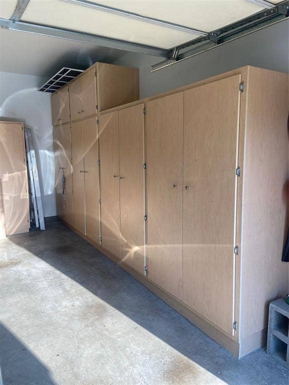 9909 Kaufman Place, Plano, TX 75025 Notice the custom Shelves & Cabinets for lots of storage