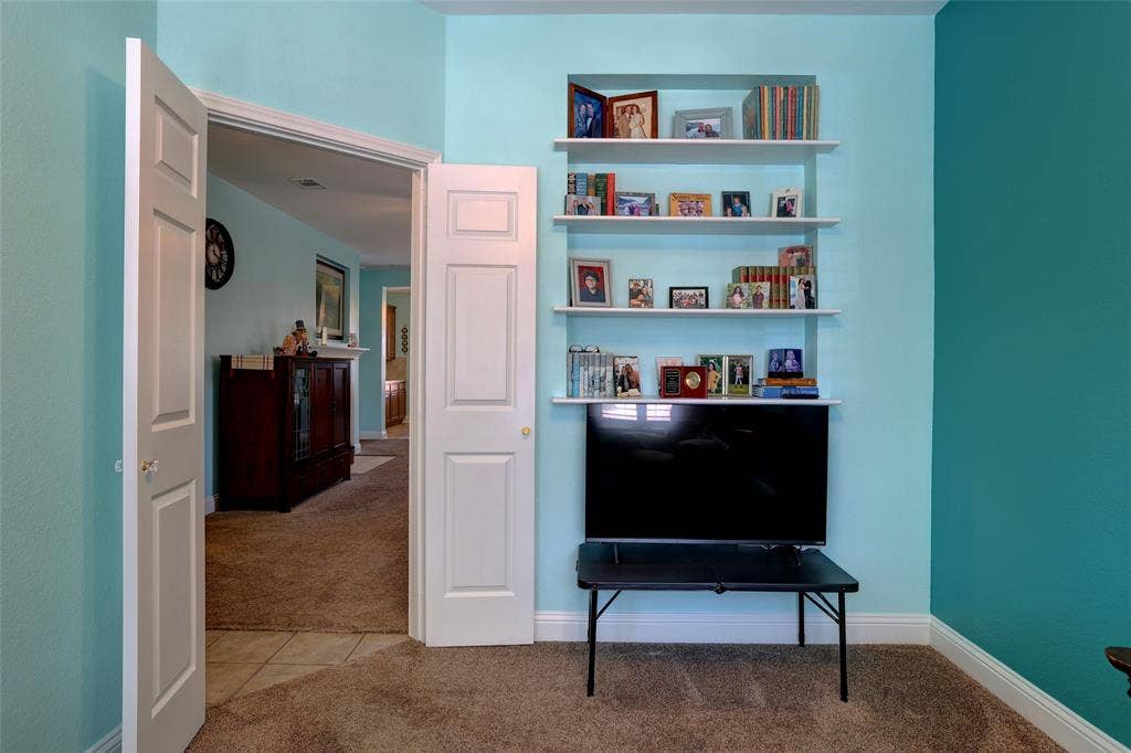 9909 Kaufman Place, Plano, TX 75025 Rare private office or study with upgraded double entry doors with built in cabinets for extra storage