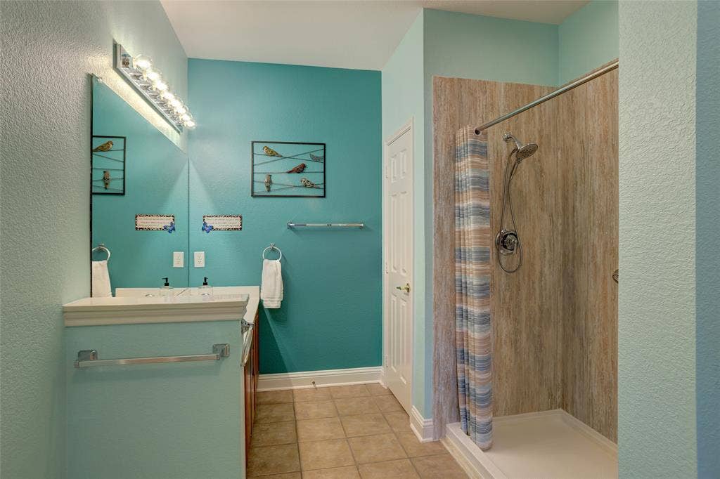 9909 Kaufman Place, Plano, TX 75025 Remodeled huge shower with beautiful stone
