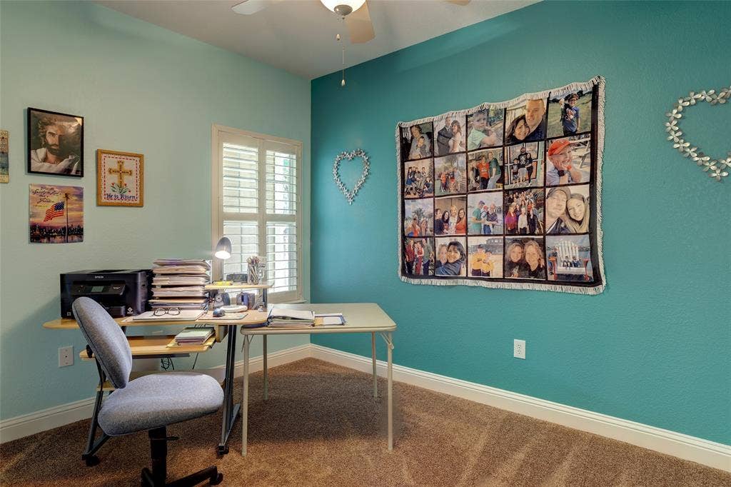 9909 Kaufman Place, Plano, TX 75025 Split from the master this bedroom is set up as office but large enough for a great sized bedroom. Make sure to check out custom closets