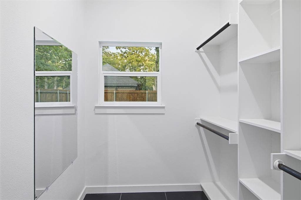 108 Parkside Drive, Trinidad, TX 75163 Primary Closet with built in shelves and mirror