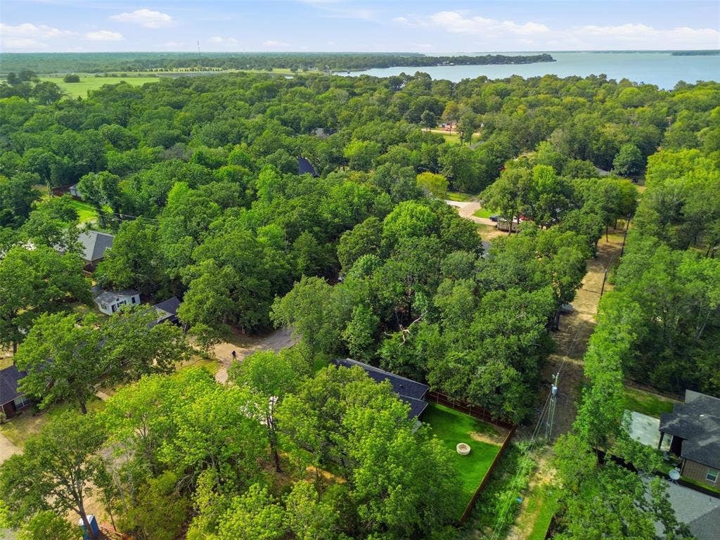 108 Parkside Drive, Trinidad, TX 75163 2 blocks away from the lake - a short stroll will get you there!