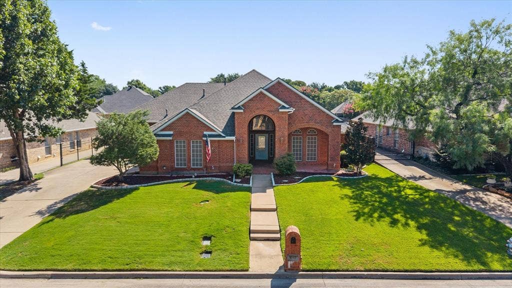 1013 Brook Arbor Drive, Mansfield, TX 76063 This home features a 2 1/2 car garage