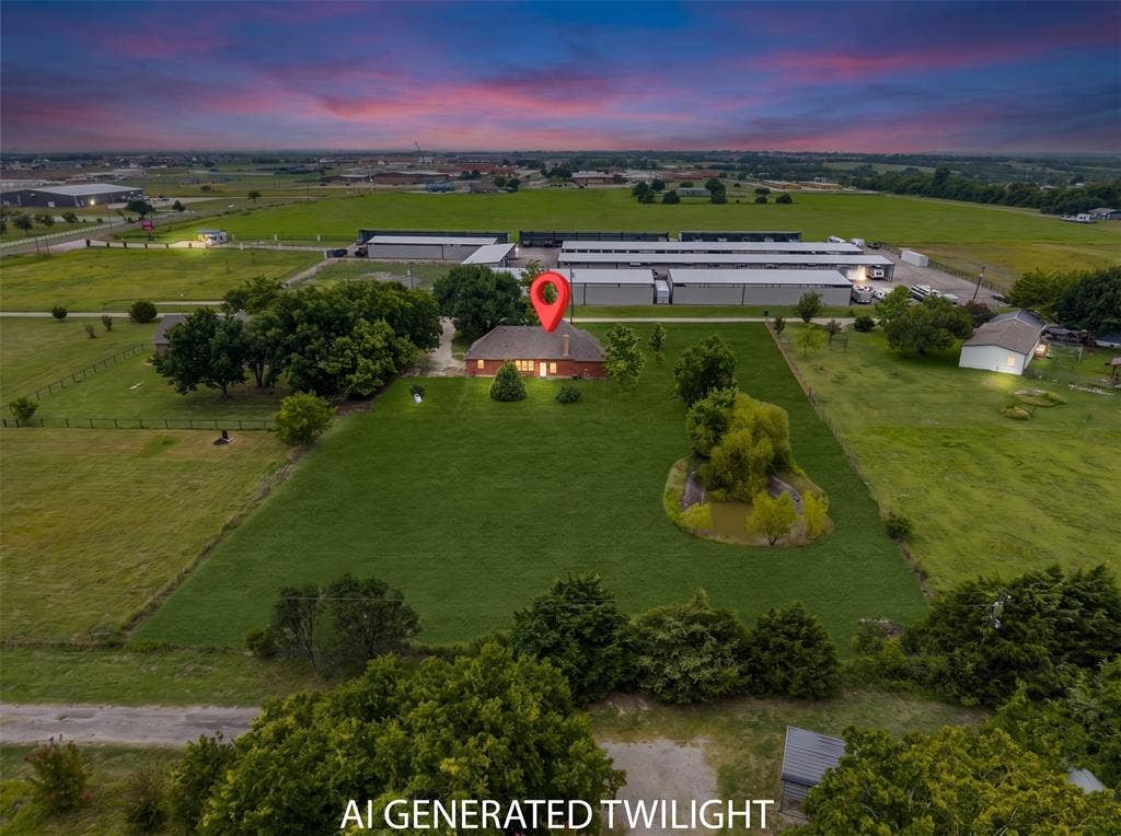 18723 Sims Lane, Nevada, TX 75173 Expansive rural property featuring a traditional brick home with a dark shingle roof, surrounded by extensive green lawns