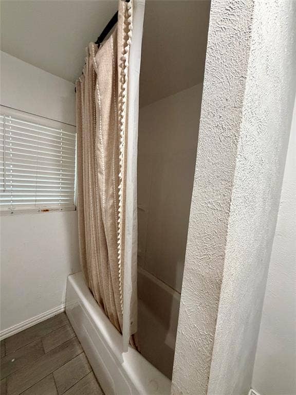 Secondary bathroom with tub shower combo