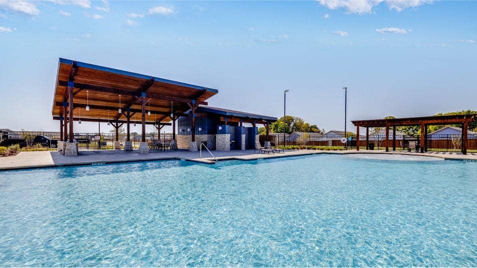 6307 Sandpiper Lane, Princeton, TX 75407 Community swimming pool with an expansive paver deck